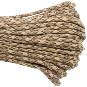 a closeup of 550 paracord - rattler on a white background