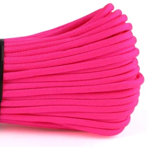a closeup of 550 paracord - hot pink on a white background