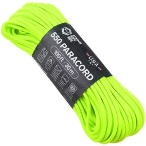 a hank of 550 paracord - neon green on a white background