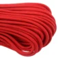 a closeup of 550 paracord - red on a white background