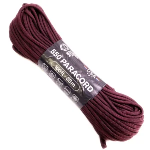 a hank of 550 paracord - maroon on a white background