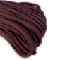 a closeup of 550 paracord - maroon on a white background